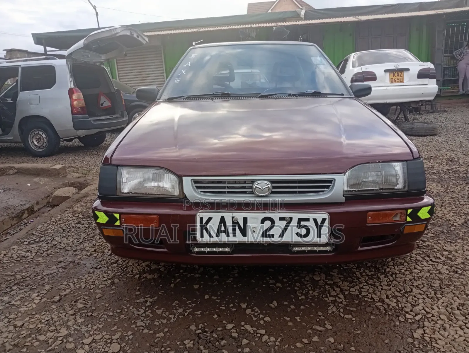 Mazda 323 1996 Maroon