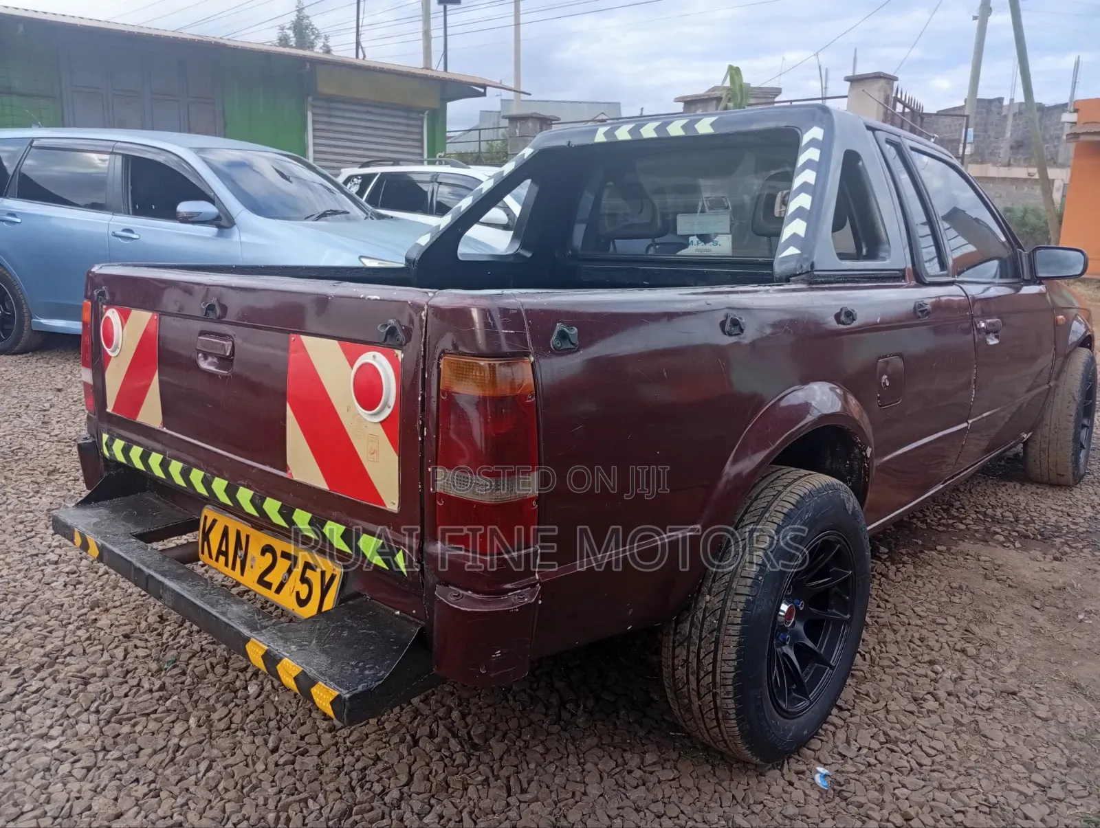 Mazda 323 1996 Maroon