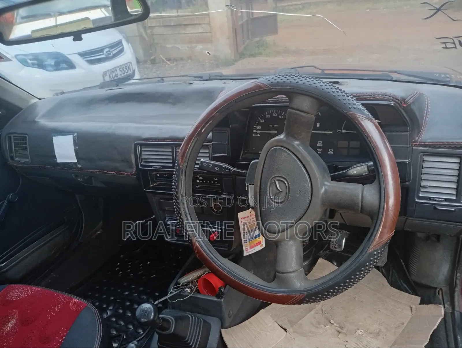 Mazda 323 1996 Maroon