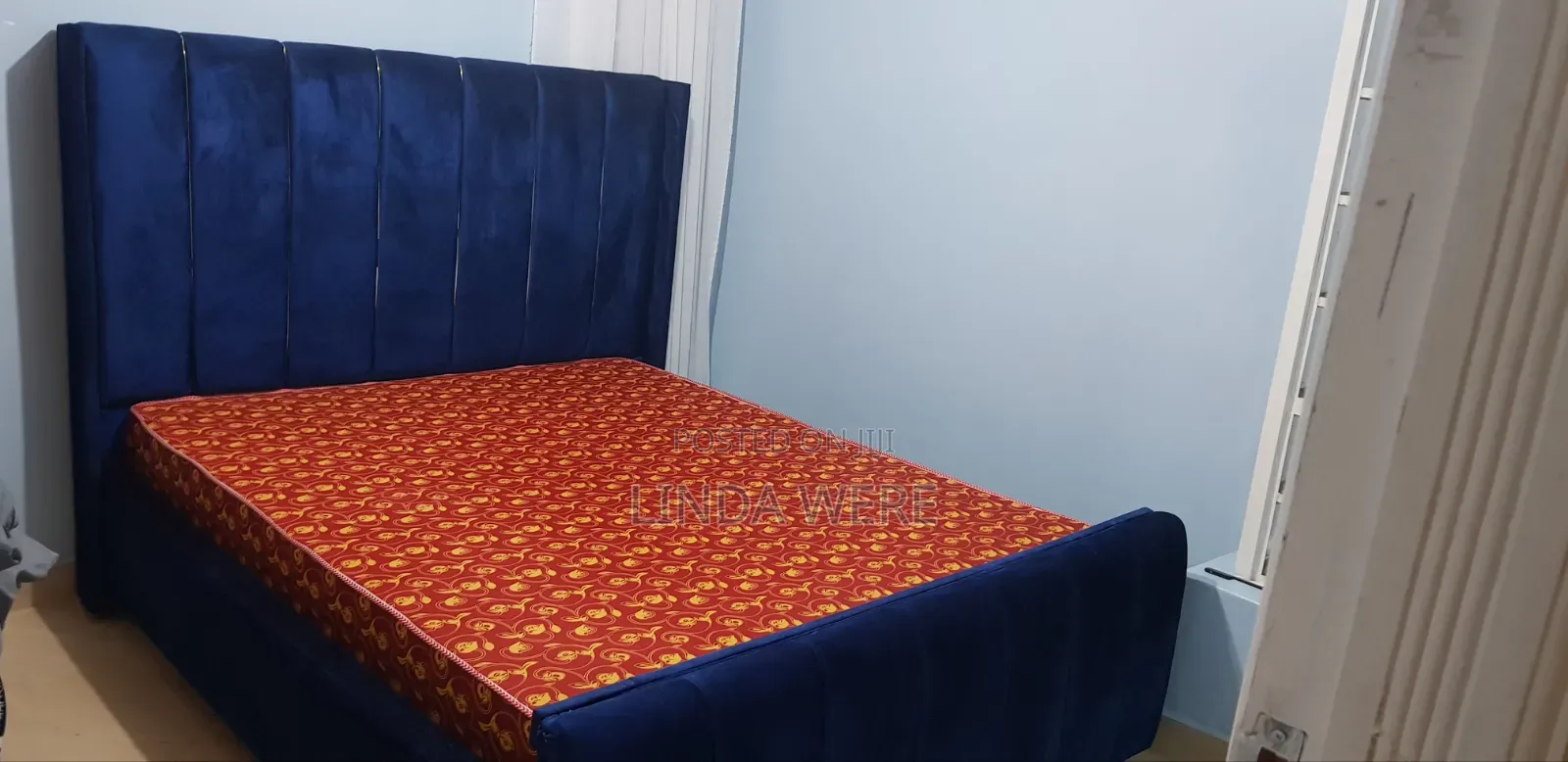 A 5 By 6 Royal Blue And Gold Strips Headboard Bed For Sale
