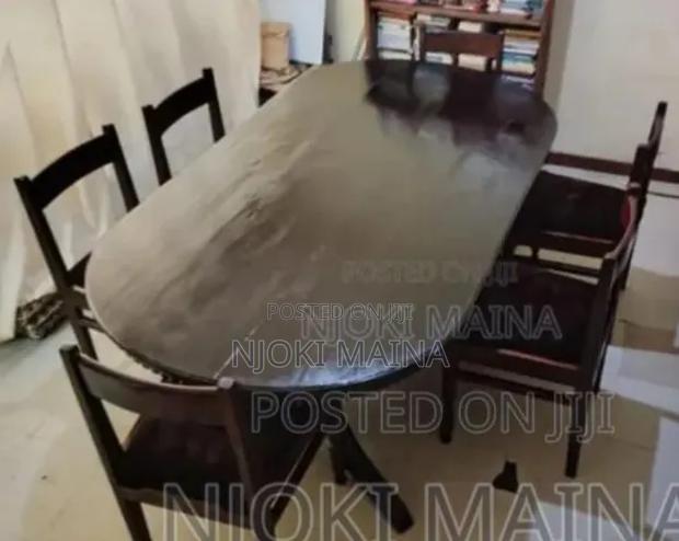 A 6 Sitter Antique Mahogany Dining Set