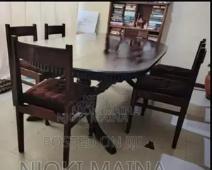 A 6 Sitter Antique Mahogany Dining Set