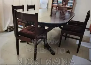 A 6 Sitter Antique Mahogany Dining Set