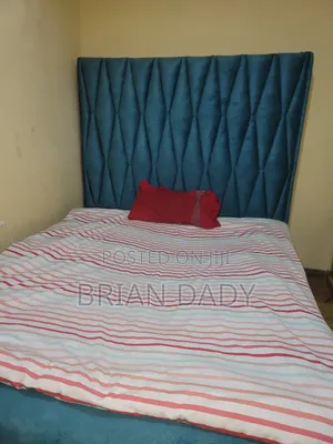5 by 6 Tufted Bed