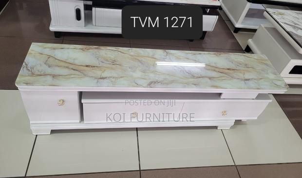 Coffee Table :White Finish and a Durable Marble-Effect Top Table