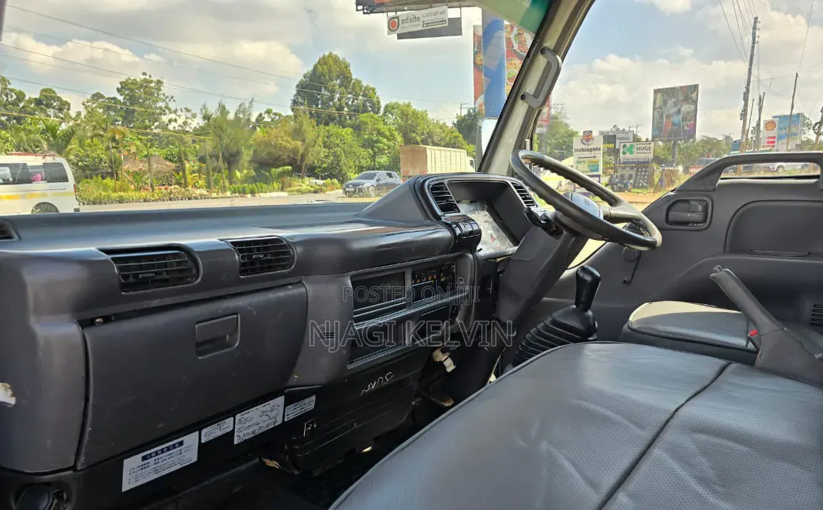 Isuzu NKR Cover Body
