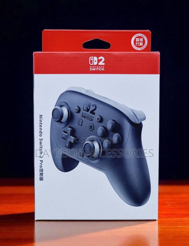 A Nintendo Switch 2 Pro Controller in a White and Red Official Box.