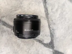 Canon Prime Lens 50mm F 1:1.8.Canon Charger Included.