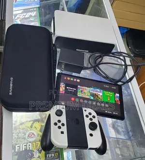 Nitendo Switch Oled Complete With All Accessories.