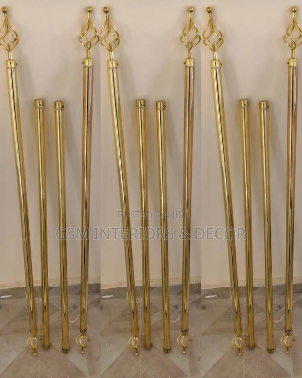 Golden Double Curtain Rods With Flowers and Caps