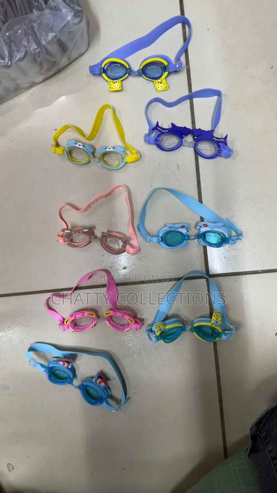 Kids Anti Fog Colorful Swimming Googles Comes With a Pair of Ear Plugs
