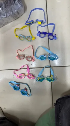 Kids Anti Fog Colorful Swimming Googles Comes With a Pair of Ear Plugs