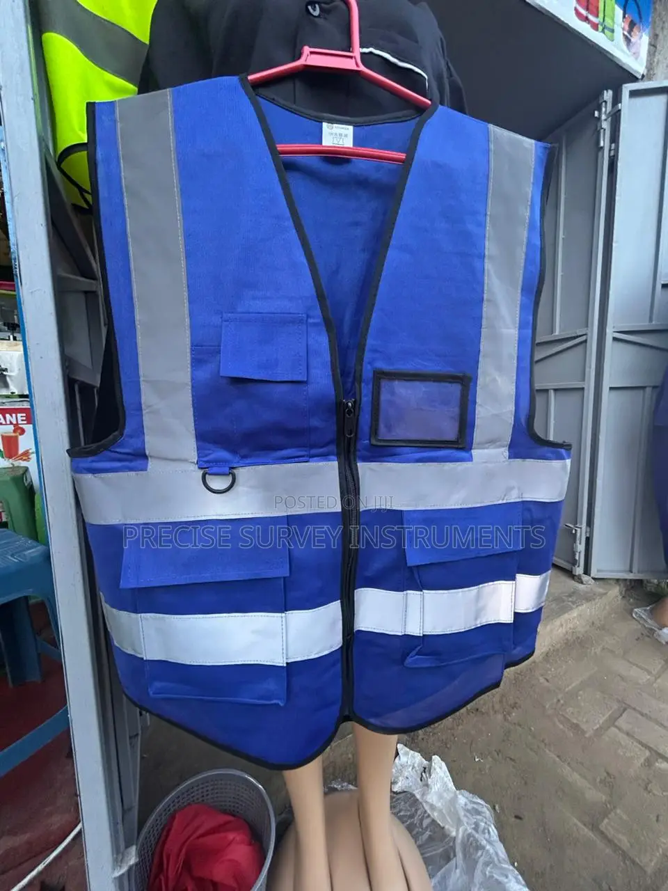 Reflective Maintenance Vest With Secure Storage Areas