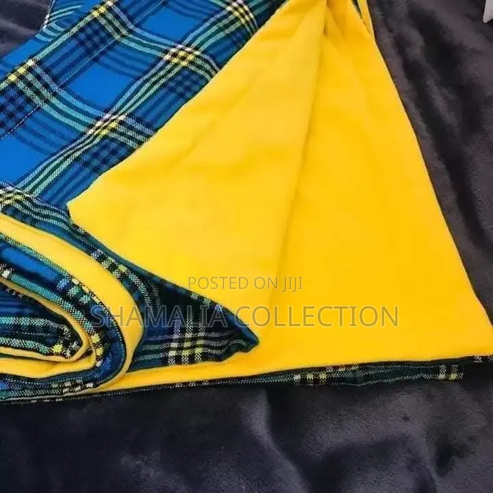 Branded Maasai Fleece Blanket – Warm Stylish
