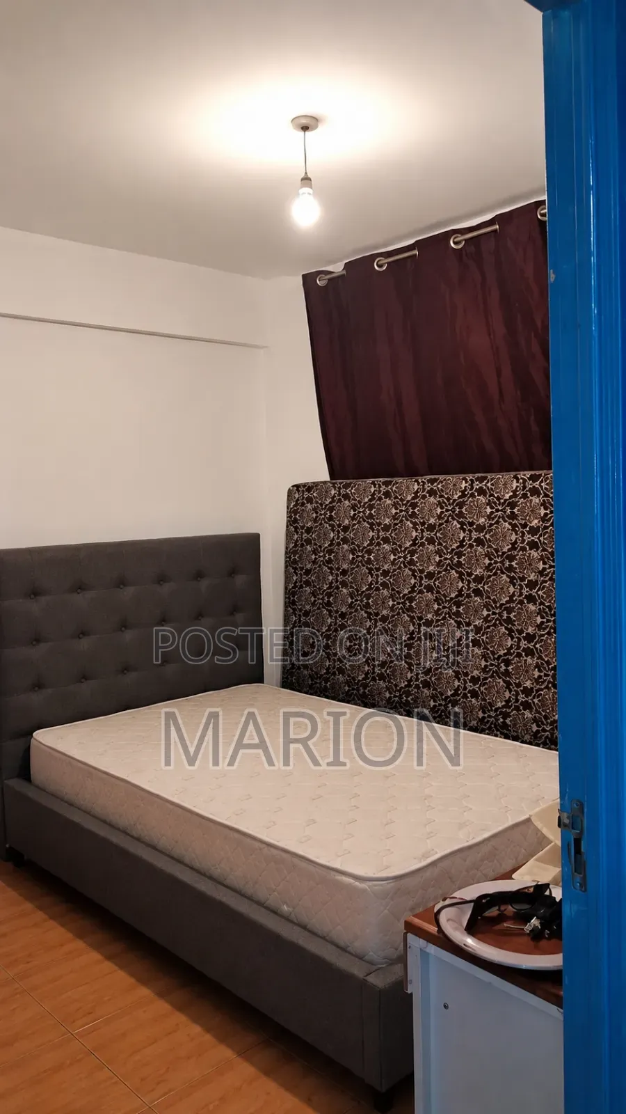 A Standard Bed and Mattress