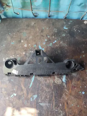 Axela 2010 Front Bumper Slide Retainers