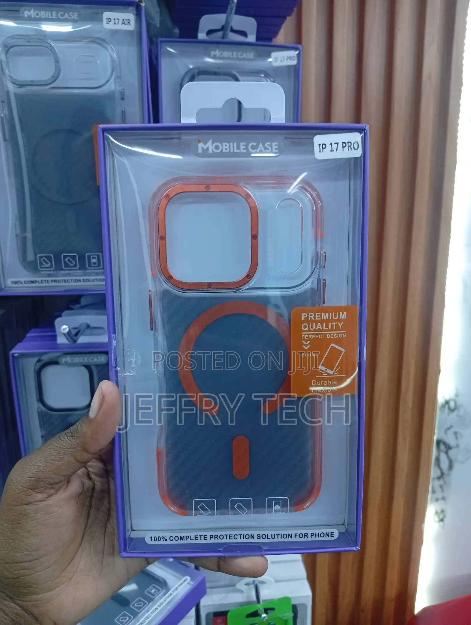 Case for the iPhone 17 Pro a Vibrant Orange Magnetic Ring on a Blue