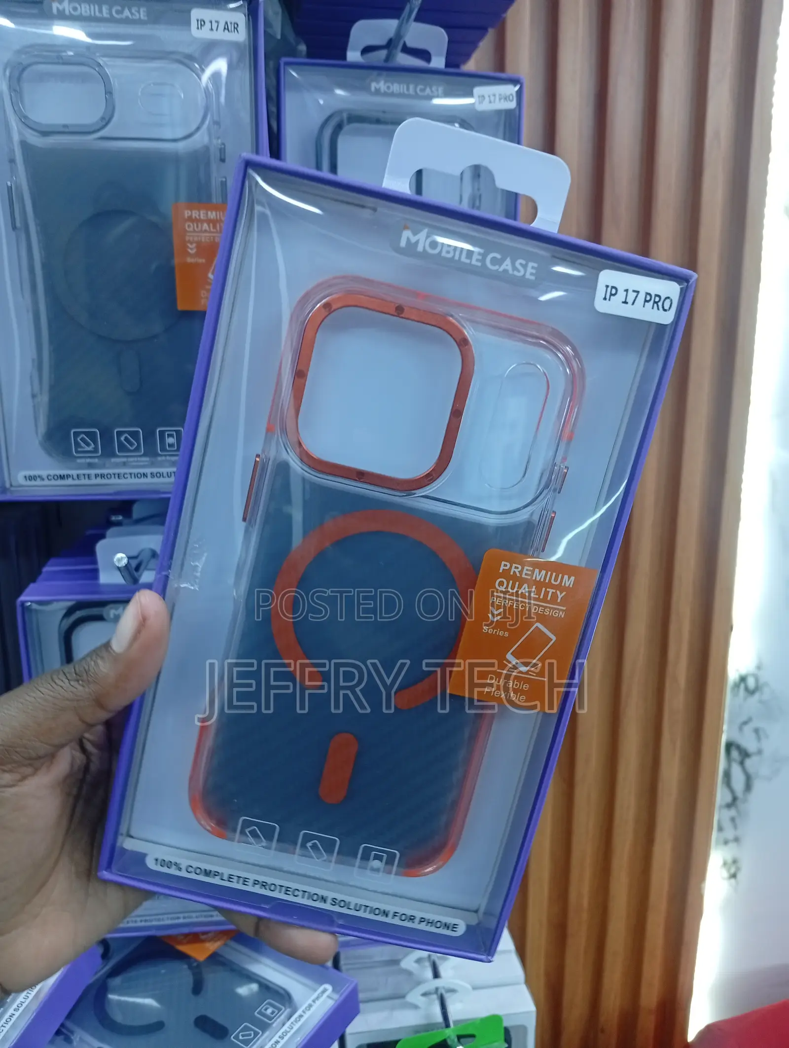 Case for the iPhone 17 Pro a Vibrant Orange Magnetic Ring on a Blue
