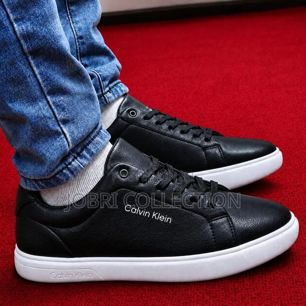 Black Sole White Leather Calvin Klein Sneakers