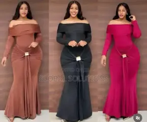 Elegant Off-Shoulder Maxi Dress Featuring a Gold Accent Front Tie Knot