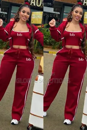 Three-Piece Tracksuit Set Features a Branded Crop Top and Jacket