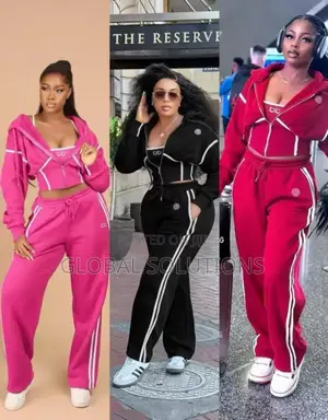 Three-Piece Tracksuit Set Features a Branded Crop Top and Jacket