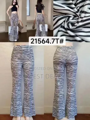 Fashion Nova Boho Dreams Zebra Flare Pants