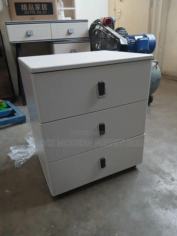 A Light Gray 4-Drawers Vertical Cabinet