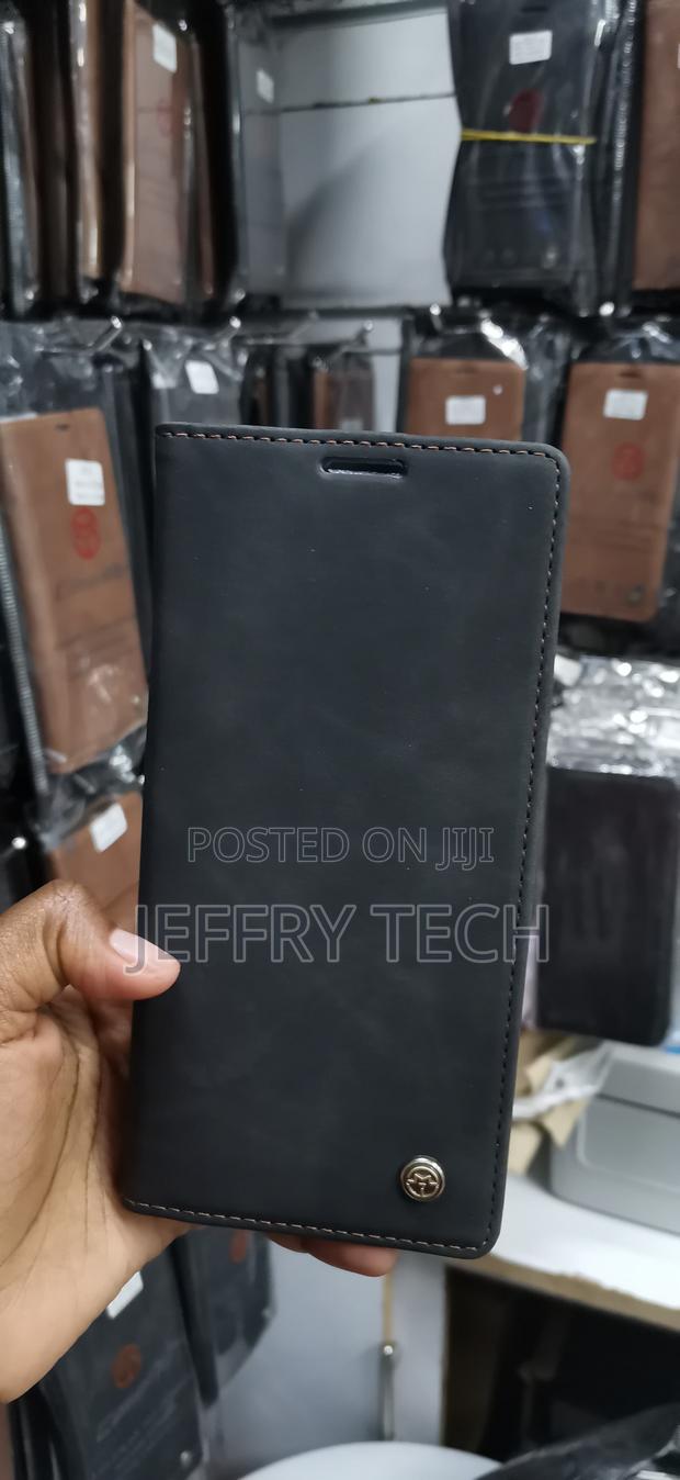 Black Suede Leather Flip Wallet Case With a Small Silver Logo Stud - main view