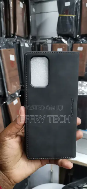 Black Suede Leather Flip Wallet Case With a Small Silver Logo Stud
