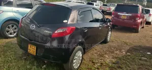 Mazda Demio 2012 Maroon