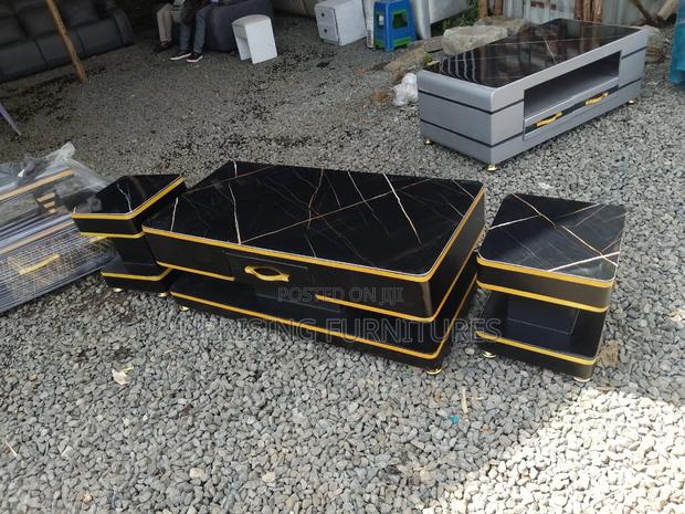 Black Gold Statement Piece Coffee Table and 2 Stools