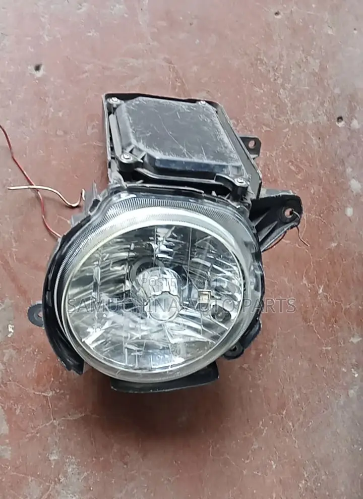 Headlight Daihatsu Move L9000s {Xenon}