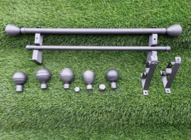 Modern Grey Curtain Rods With End Flowers and Wall Brackets