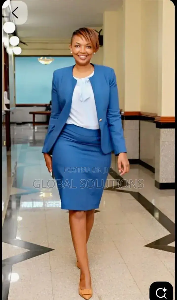 Fitted Two-Piece Skirt Suit Featuring a Collarless Blazer