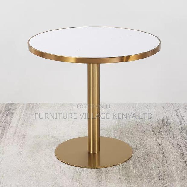 Round Silver Tulip Dining Table