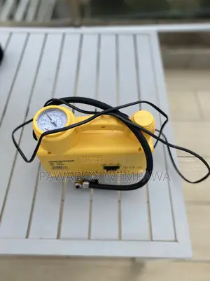 Air Compressor Including a Mini Power Station