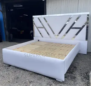 Extended Headboard Bed With Reflective Mirrors