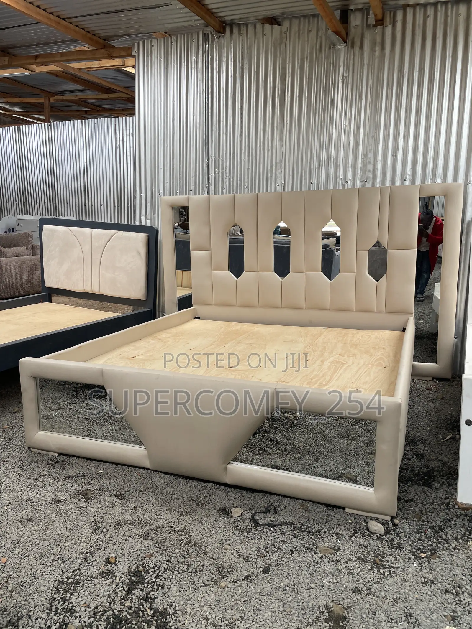 Extended Headboard Bed With Reflective Mirrors