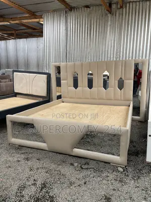 Extended Headboard Bed With Reflective Mirrors