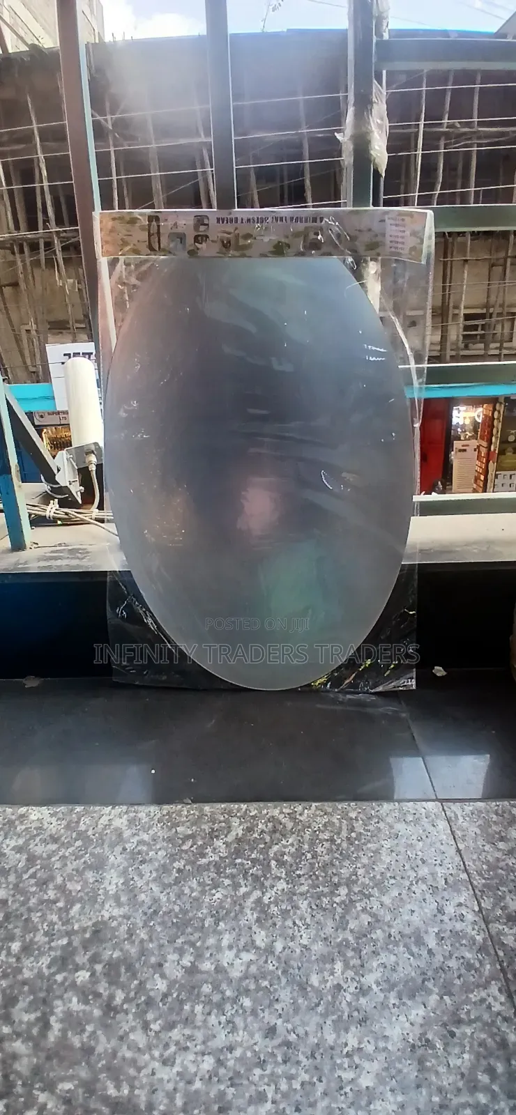 Oval Frameless Mirror