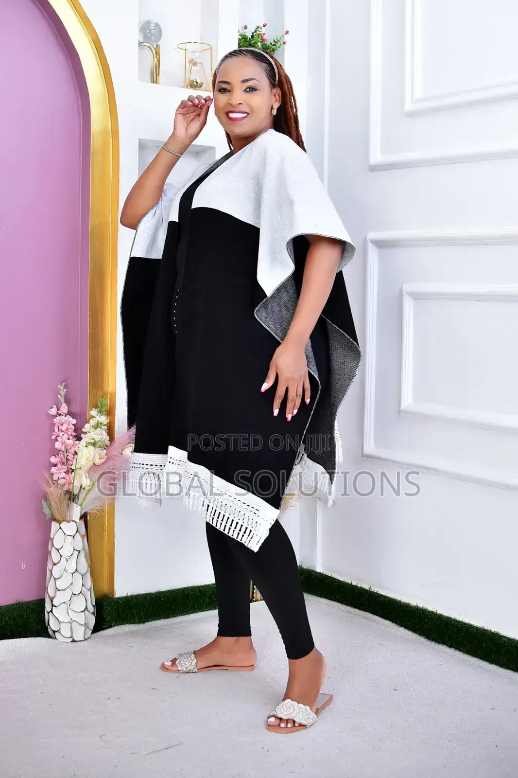 Coloured Warm Tasseled Poncho Featuring a Contrast Color-Block Design