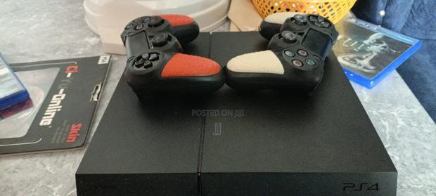 Ps4 Slightly Used,2 Controllers+Covers,3 Games and Ps4 Skin - thumbnail 2