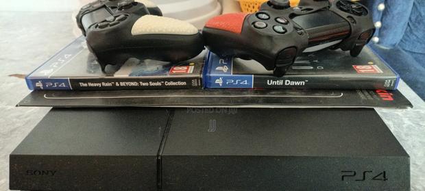 Ps4 Slightly Used,2 Controllers+Covers,3 Games and Ps4 Skin