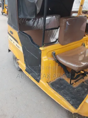 Bajaj RE 2021 Yellow