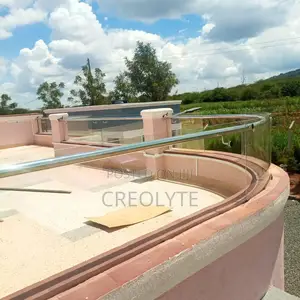 Curved Frameless Glass Balustrade With Stainless Steel Handrail