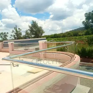 Curved Frameless Glass Balustrade With Stainless Steel Handrail