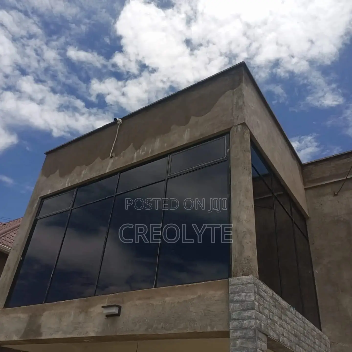 Corner Aluminium Fixed Windows – Dark Frame Tinted Glass