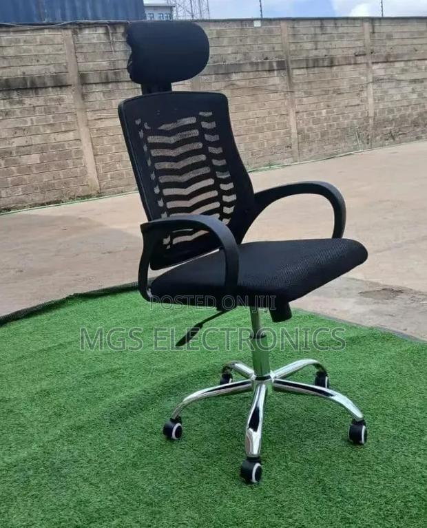 Secretarial Mesh Chair ~ Adjustable Headrest and Lumbar Support at 5500