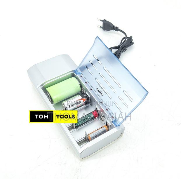Universal Simultaneous Charger For Rechargeable Aa, Aaa, C, D, 9v